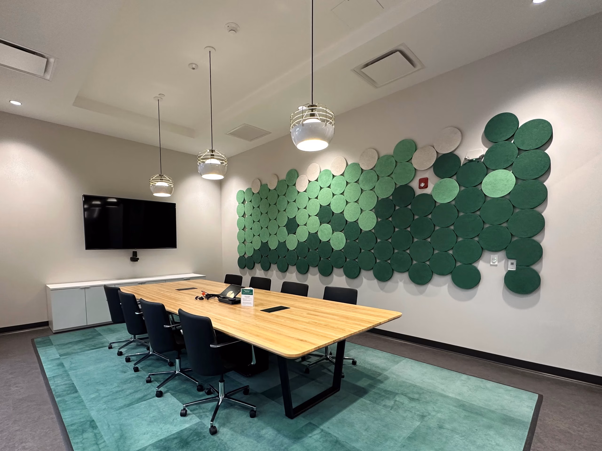 acoustic panels and baffles geometric acoustic panels in an office space and conference room